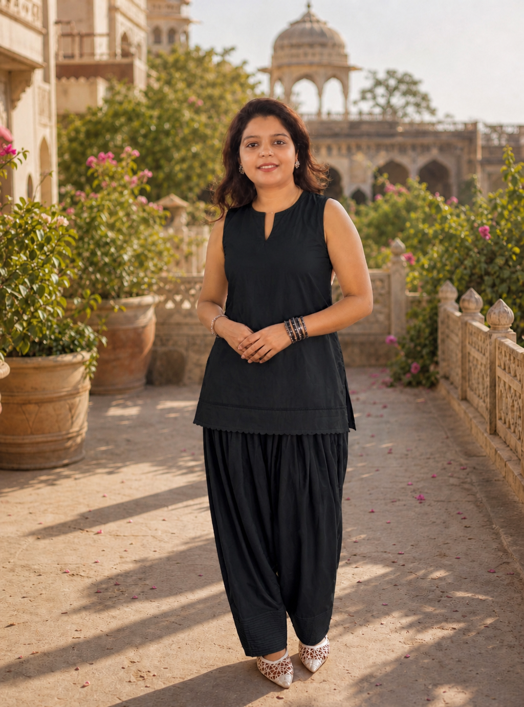 Kaala Noor: Women's Black Cotton Sleeveless Kurti with Farshi Salwar Set